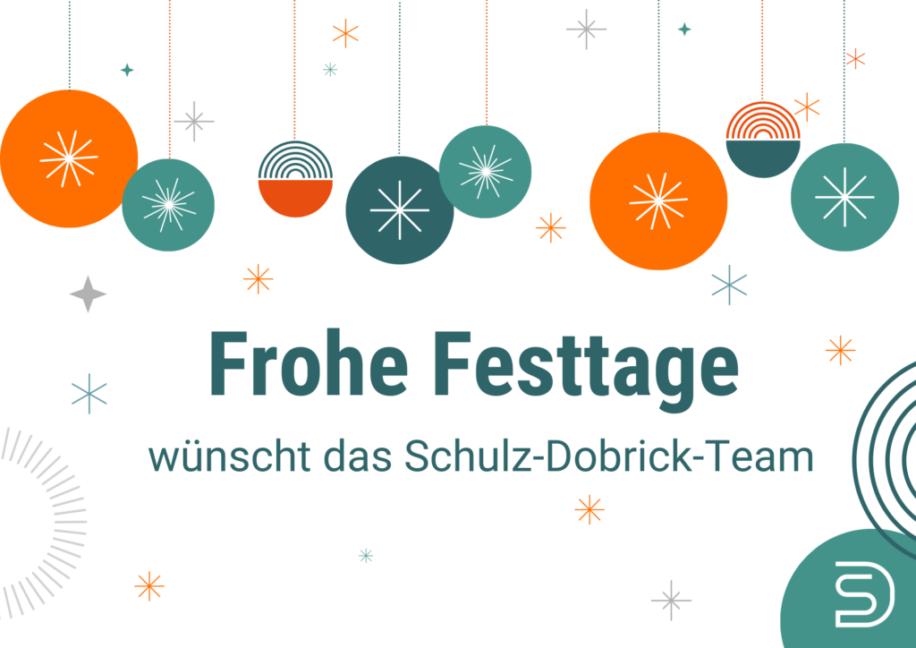 Frohe Festtage wünscht das Schulz-Dobrick-Team mit bunten Weihnachtskugeln